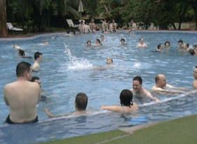 After a long hot day, no better way to cool down then sipping Singha beer in the pool.