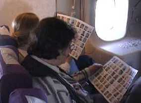 Orchestra members reading the special Airline edition of the PSO magazine VHV