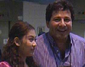 Conductor Jules van Hessen is greated upon arrival