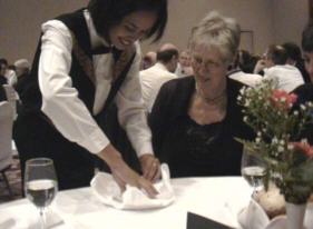 Boukjen Passchier learns how to fold napkins like a pro